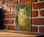a picture of a cat on a brick wall