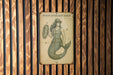 a picture of a sign on a wooden wall