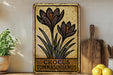 a picture of some flowers on a shelf