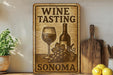a wine tasting sign on a shelf next to a potted plant
