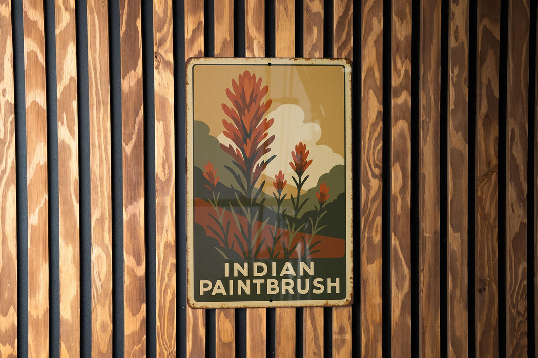 a wooden wall with a sign that says indian paintbrush