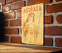 a sign on a brick wall that says astraea
