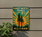 a sign on the side of a building that says hartwick pines michigan