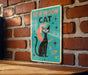a picture of a black cat sitting on a table