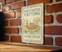a sign on a brick wall that says whitewater rafting snake river