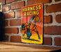 a sign on a brick wall that says harness racing