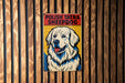 a picture of a dog on a wooden wall