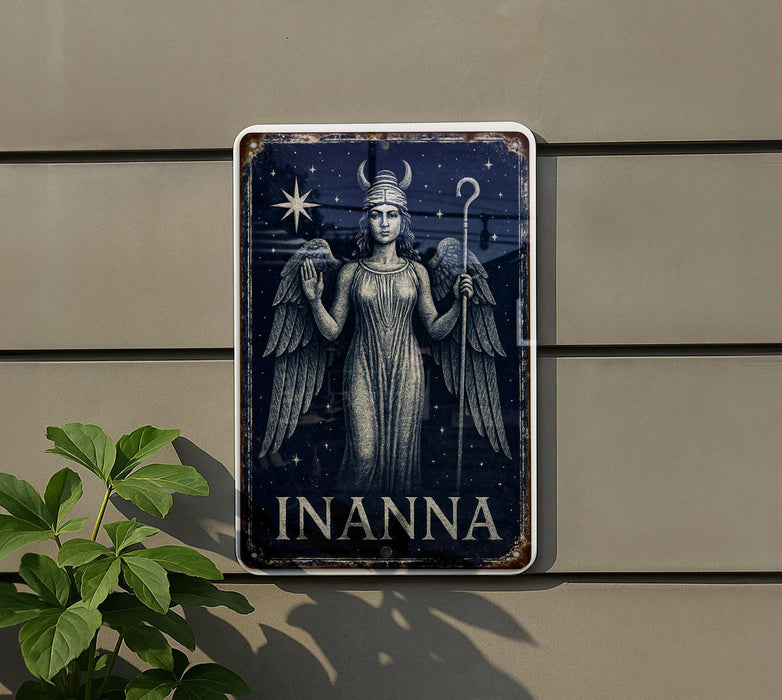 a metal sign with an image of an angel holding a staff
