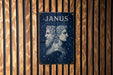 a picture of janus on a wooden wall