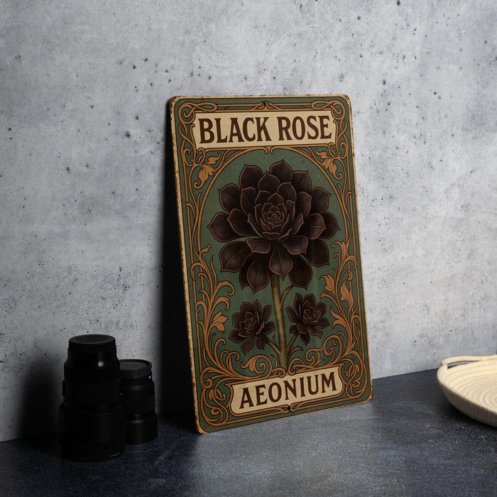 a black rose book sitting on top of a table