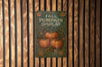 a sign on a wooden wall that says fall pumpkin display
