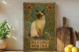 a picture of a cat sitting on a shelf