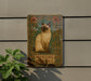 a picture of a cat on the side of a building