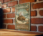 a sign on a brick wall that says snowmobiling upper peninsula
