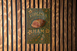 a sign on a wooden wall that says virginia ham