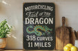a sign that says motorcycling tail of the dragon