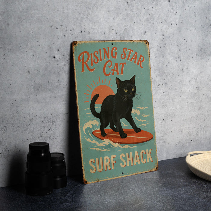 a black cat standing on top of a surfboard