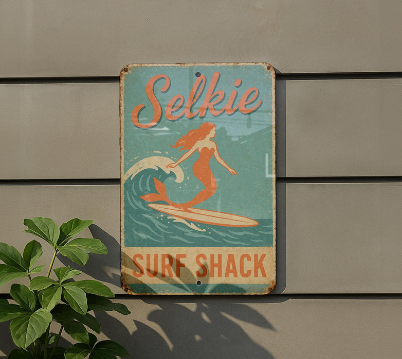 a sign on the side of a building advertising a surf shack