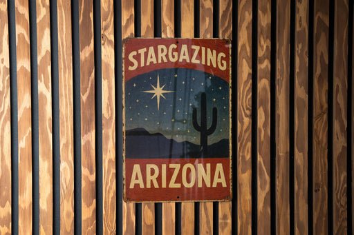 a sign on a wooden wall that says stargazing arizona