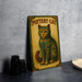 a picture of a cat sitting on top of a table