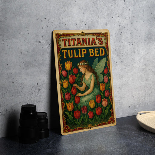 a tin sign with a fairy sitting on a bed of tulips