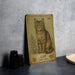 a picture of a cat sitting on top of a table