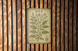 a picture of a wooden wall with a sign on it