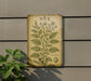 a picture of a plant on a wall