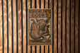 a picture of a sign on a wooden wall