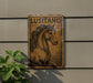 a sign on the side of a building that says lusitano