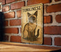 a picture of a cat on a brick wall