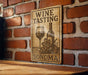 a wine tasting sign on a brick wall