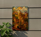 a vibrant stained glass artwork depicting a group of foxes in a natural setting, with a colorful and intricate design.