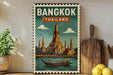 A vintage-style poster of the Wat Phra Mahathat temple in Bangkok, Thailand, featuring a boat on the river and a temple in the background.