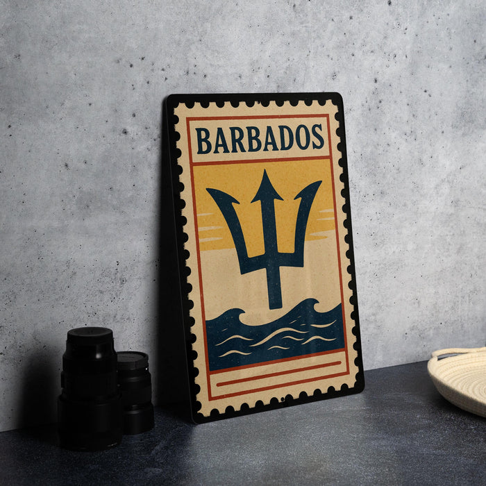 A metal sign with the word "BARBADOS" and a trident symbol is displayed on a table, accompanied by a stack of black camera lenses and a white dish.