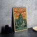 A metal sign with the text "BELFAST NORTHERN IRELAND" and an illustration of a building, likely representing the Belfast Northern Ireland region.