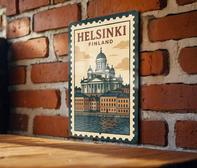 A vintage-style metal sign with the text "HELSINKI FINLAND" and an illustration of the Helsinki Cathedral, a famous landmark in Finland.