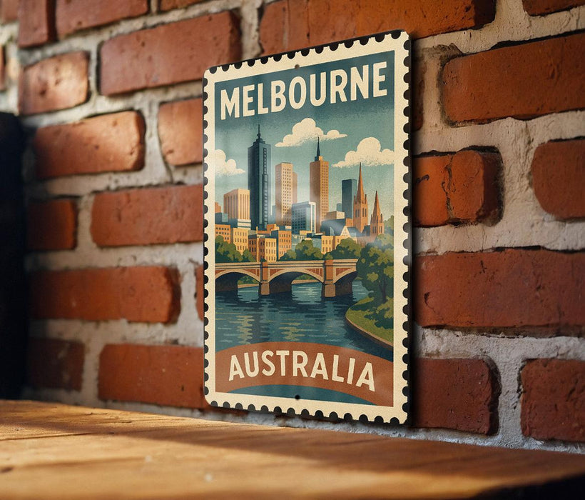 A vintage-style metal stamp depicting the Melbourne skyline, with the text "Melbourne Australia" prominently displayed.