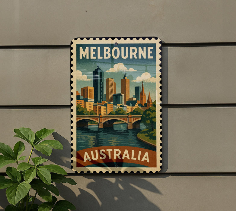 A vintage-style metal sign with the text "Melbourne Australia" displayed on it, featuring an illustration of the Melbourne skyline and a river.