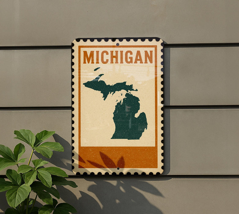 A Michigan state map is displayed on a wall, with a plant to the left of the frame.