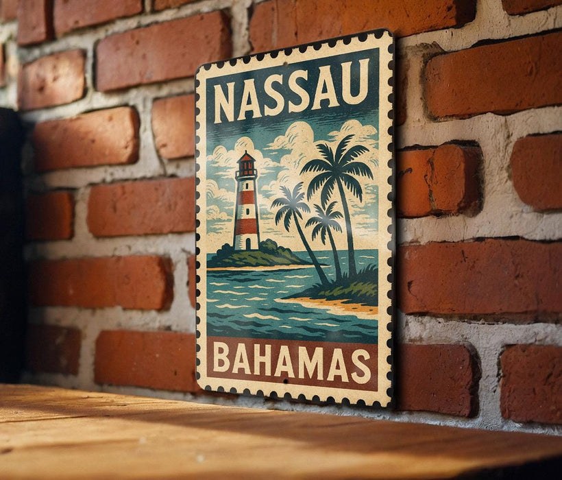 A vintage-style metal sign with the text "NASSAU BAHAMAS" and an illustration of a lighthouse and palm trees, mounted on a brick wall.