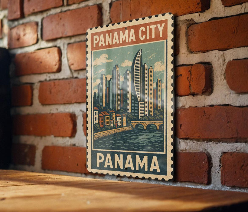 A vintage-style poster of Panama City, featuring a cityscape with a bridge and water, is displayed on a brick wall.