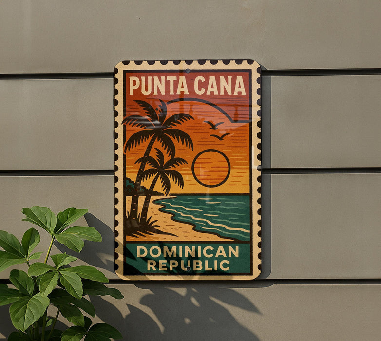 A vintage-style sign for Punta Cana, the Dominican Republic, featuring a palm tree and sunset.