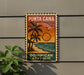 A vintage-style sign for Punta Cana, the Dominican Republic, featuring a palm tree and sunset.