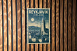 A vintage-style postage stamp from Iceland featuring a cityscape with a church spire and mountains in the background.