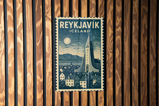 A vintage-style postage stamp from Iceland featuring a cityscape with a church spire and mountains in the background.