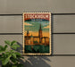 A vintage-style postage stamp depicting the city of Stockholm, Sweden, with a colorful illustration of the cityscape and a church spire.