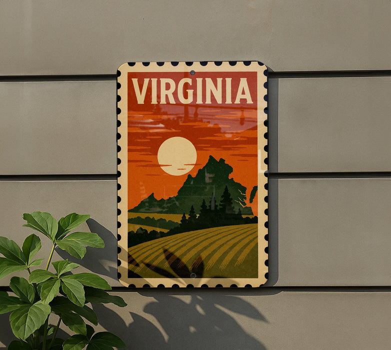 A vintage-style postage stamp depicting a rural landscape with a large sun in the sky, mounted on a wall next to a plant.
