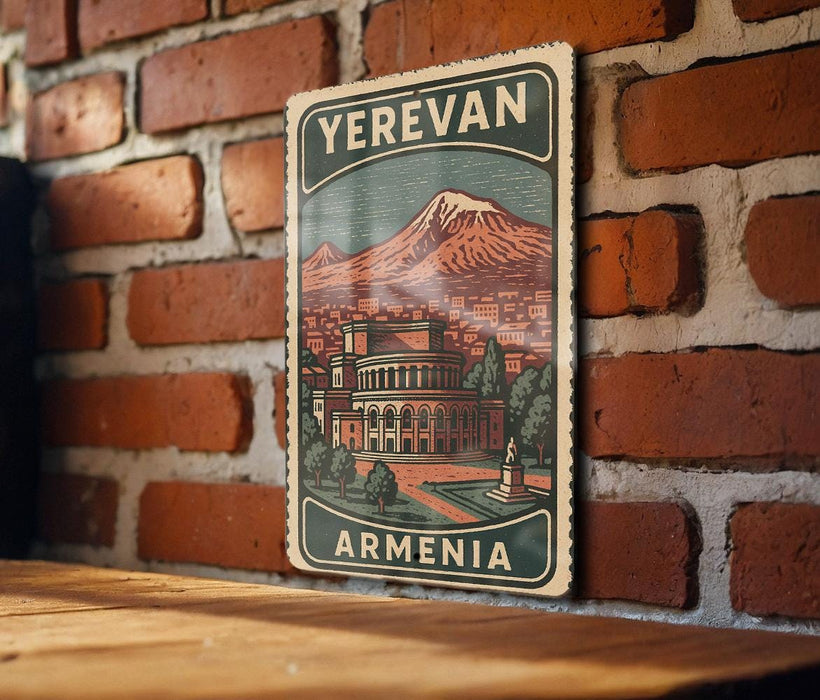 A vintage-style sign with the text "YEREVAN ARMENIA" is displayed on a brick wall, featuring an illustration of a cityscape with a mountain in the background.