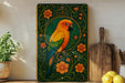 a vibrant, colorful parrot perched on a branch, surrounded by a lush green and orange floral design. The parrot is the central focus of the image, with a wooden cutting board and a potted plant visible in the background.